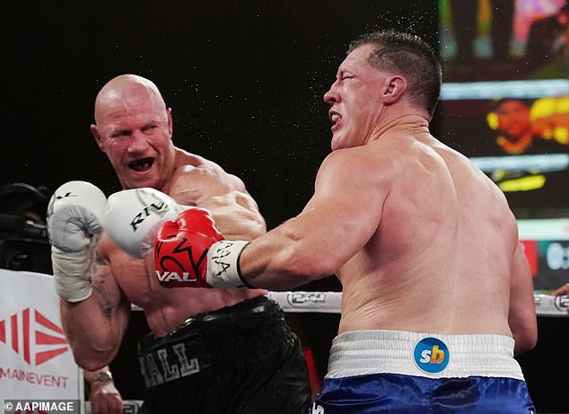 The former Swans captain (pictured in his first professional fight against NRL great Paul Gallen) believes he will stop Scott in Wednesday night's match