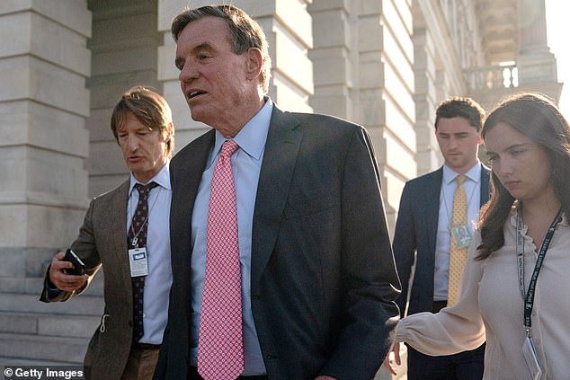 Sen. Mark Warner (D-Va.) called for talks on the strongest path forward, saying Trump is a threat to democracy