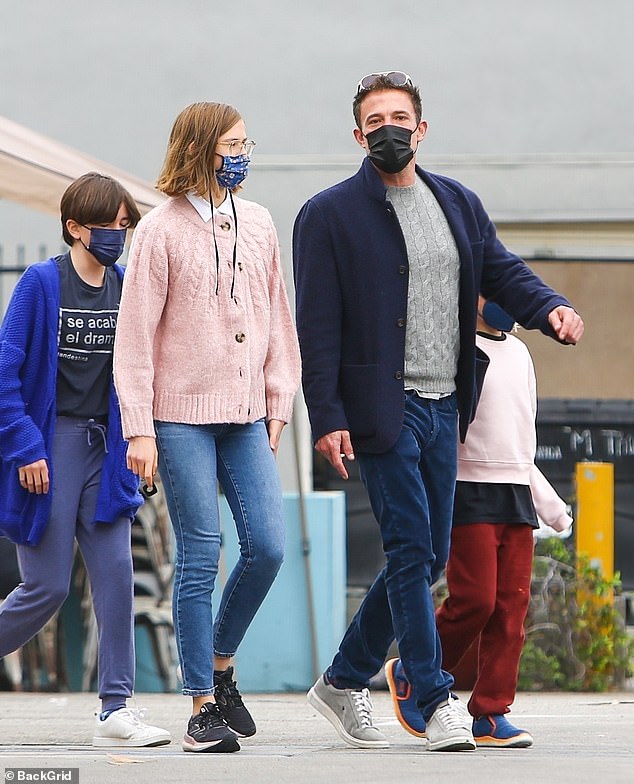 Violet has been consistently seen wearing a mask in recent years, long after the COVID-19 mask mandate, though her parents have never publicly explained why; seen with Ben in 2021