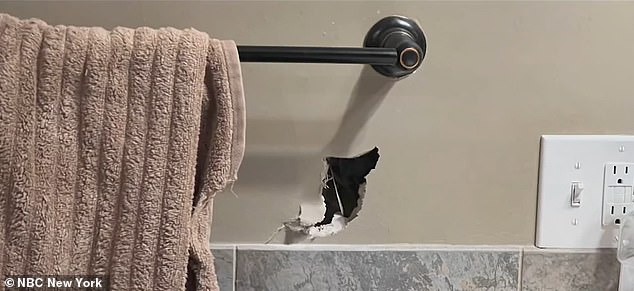 The piece of metal then went through the house and into the bathroom