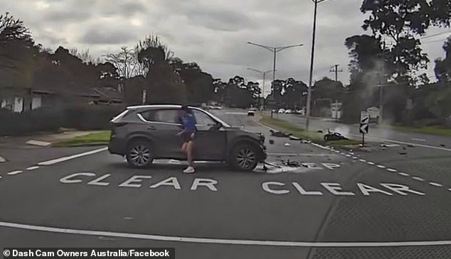 Dashcam footage shows the motorcyclist passing cars at high speed before being hit by a gray SUV at an intersection