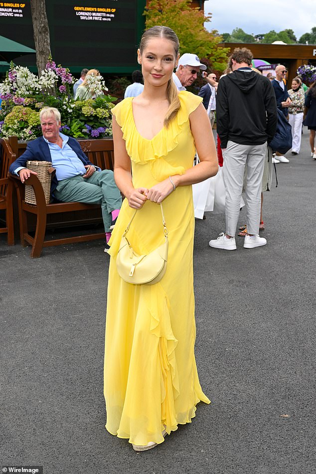 Hannah Dodd turned heads in a striking yellow ruffled dress that showed off her incredible figure