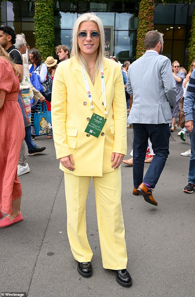 Bethany England stood out in a light yellow suit