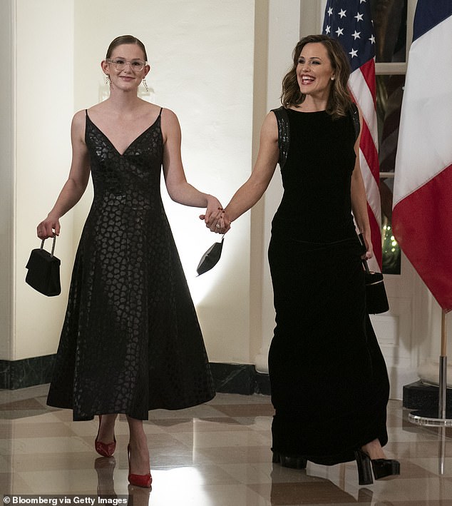 Garner, right, and Violet Affleck arrive to attend a state banquet honoring French President Emmanuel Macron and Brigitte Macron, hosted by U.S. President Joe Biden and First Lady Jill Biden at the White House in Washington, D.C. in 2022