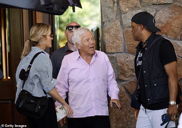 NFL New England Patriots owner Robert Kraft, founder, chairman and CEO of the Kraft Group, talks outside the resort