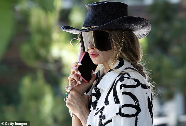 Stacey Bendet Eisner, CEO of fashion brand Alice + Olivia, looked stylish as she arrived wearing large black sunglasses