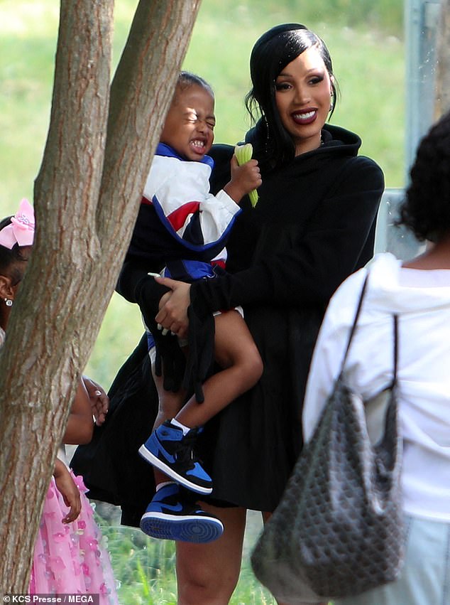 The Grammy Award-winning rapper, 31, was seen holding her two-year-old son Wave as they inspected the animal enclosures