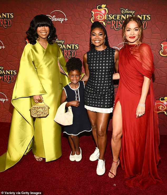 Brandy pictured with fellow entertainers Gabrielle Union, her daughter Kaavia and co-star Rita