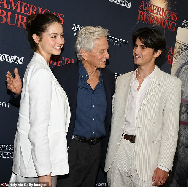 His son and daughter coordinated in stylish beige and white outfits