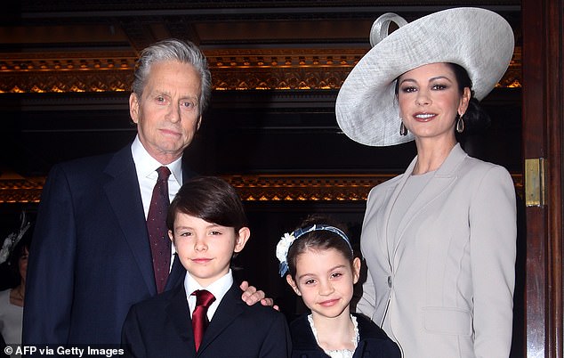 Douglas, wife Catherine and their children Dylan and Carys pictured in 2011