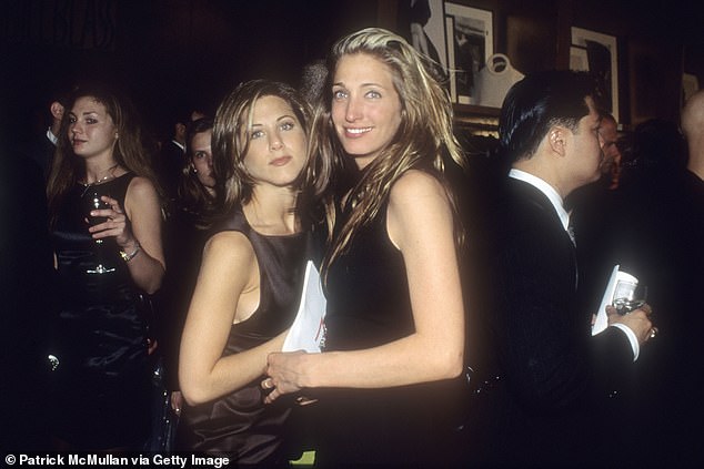 Carolyn, with actress Jennifer Aniston at an event in New York City, January 1990, reluctantly agreed to go on the fatal flight