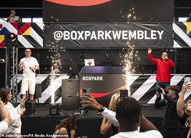 Aitch rocked an all-white outfit and red cap while performing on the Coca-Cola Zero Sugar stage