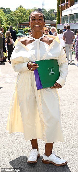 She posed with an Emirates gift bag