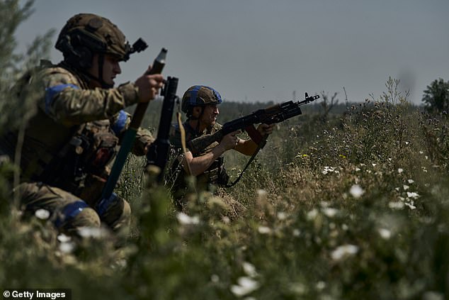 Ukrainian infantry fires on Russian positions on the zero line of the front in prepared trenches 100 meters from the Russian trenches on July 5, 2025 in the direction of the Toretsk region