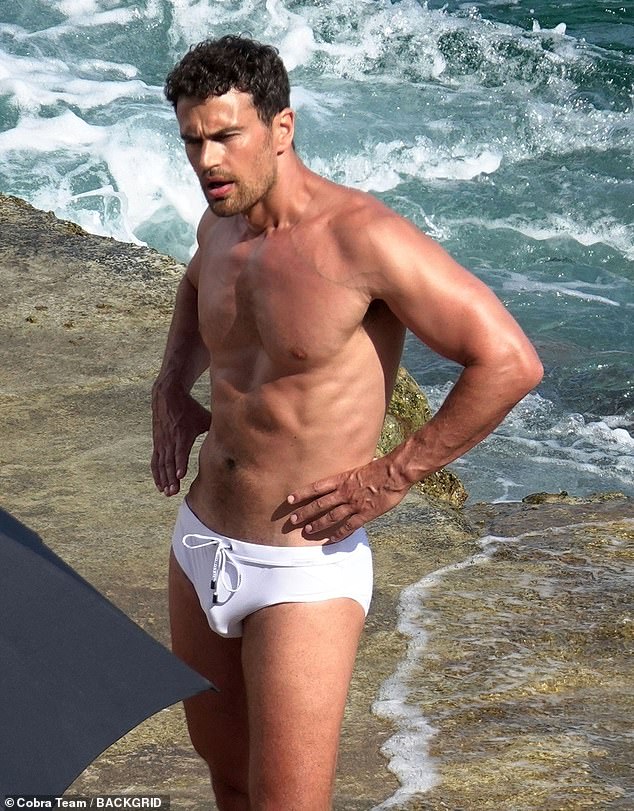 Theo James in his tight underwear. The photos, taken in Capri, were for a Dolce & Gabbana ad, although it is unclear what the fashion designers were advertising, as no one in the photos appears to be wearing clothes