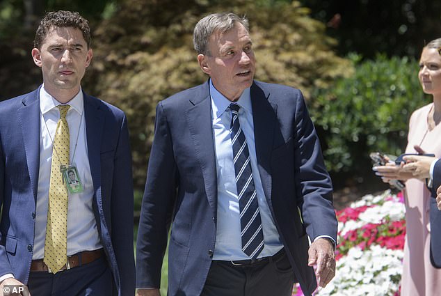 Sen. Mark Warner (D-Va.), who canceled a meeting to discuss Biden earlier this week, did not take questions before entering the closed-door meeting.