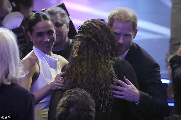 The Duchess opted to put her tanned shoulders on full display at the ESPYs by combing her locks back into a chic low bun