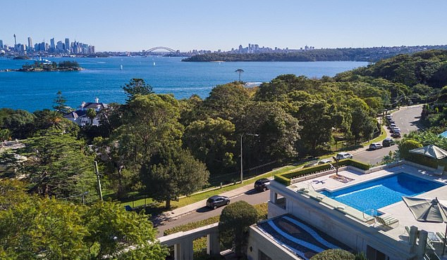 The UBS Global Wealth Report predicts a 21 percent increase in the number of people considered millionaires, due to rising house prices, inheritances and a booming stock market (pictured is a house in Vaucluse in Sydney's east).