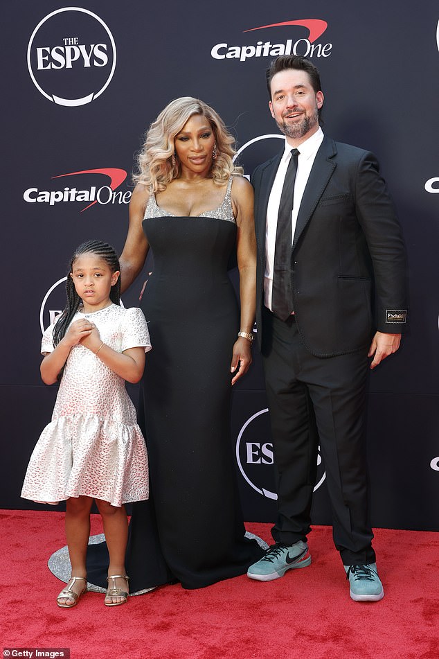 Their daughter Olympia opted for a silver dress and matching silver ballerinas for the red carpet look