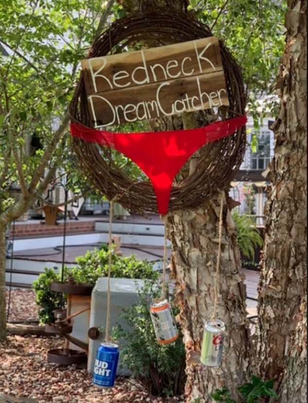 A 'redneck dream catcher' made from a wooden wreath with beer cans and underwear