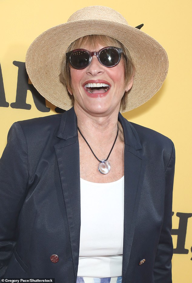 Patti LuPone walked the red carpet in a navy jacket with a white top and blue and white striped pants