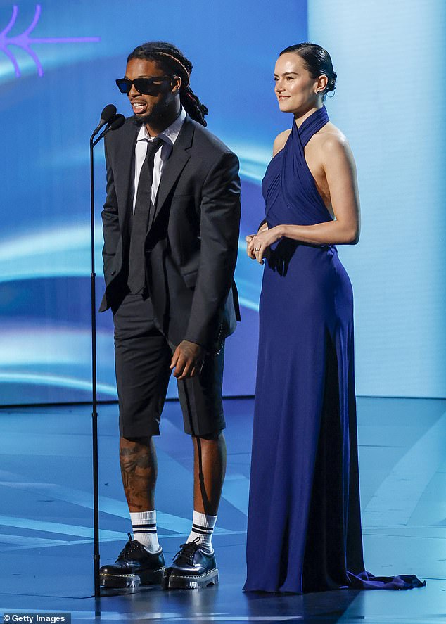 She did take the stage to present an award along with Buffalo Bills safety Damar Hamlin during the broadcast.