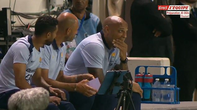 Olympic team coach Thierry Henry (right) looked surprised as Olise's daring shot found the net