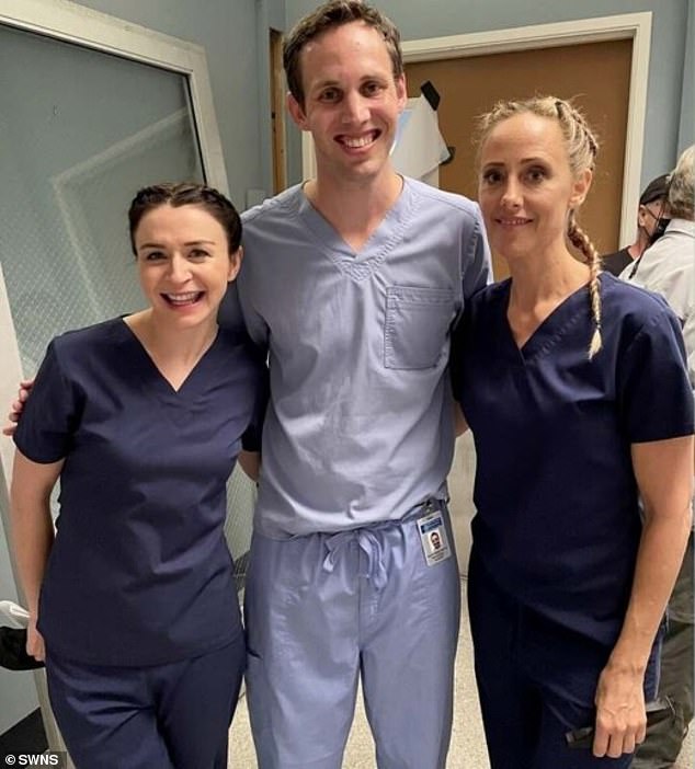 Bergin (center) is pictured with Caterina Scorsone who plays Dr. Amelia Shepherd (left) and Kim Raver who plays Dr. Teddy Altman (right) on set