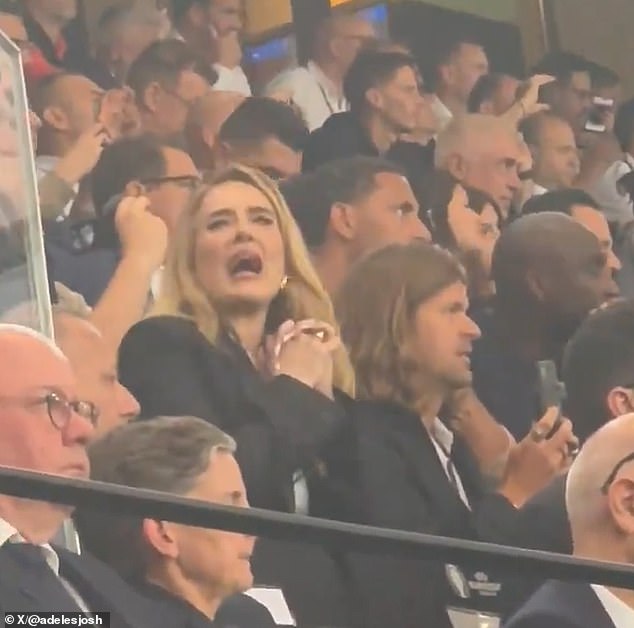 Football fan Adele was seen passionately shouting at the noisy English crowd to 'be quiet!' just before Harry Kane took his penalty during the Three Lions' European Championship semi-final on Wednesday