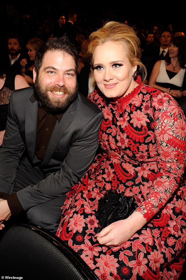 When Simon and Adele split in 2019, the couple remained neighbors in Los Angeles so they could keep things as normal as possible for their son (pictured in 2013 0