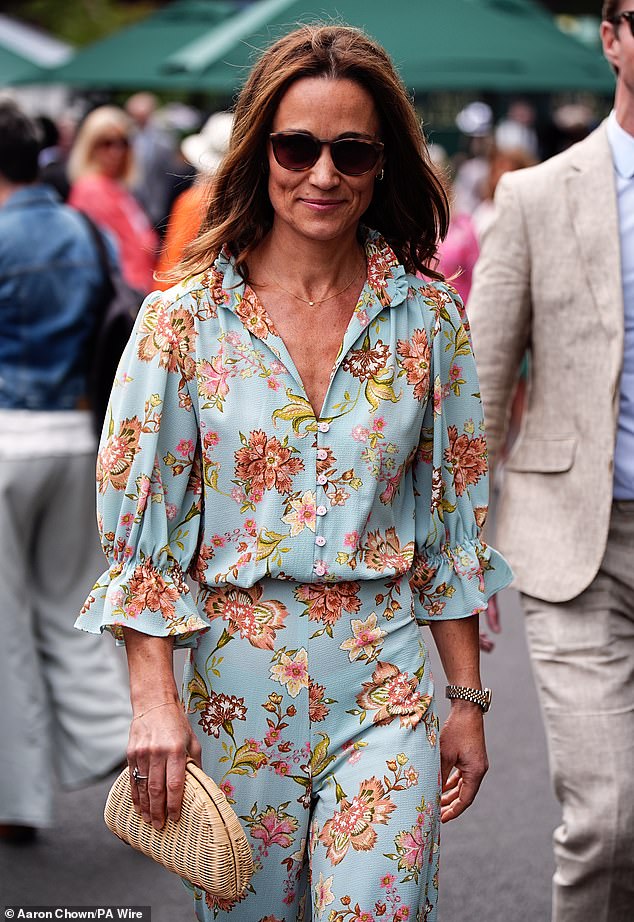 It's all about the accessories: Pippa looked stylish in sunglasses and a dainty necklace