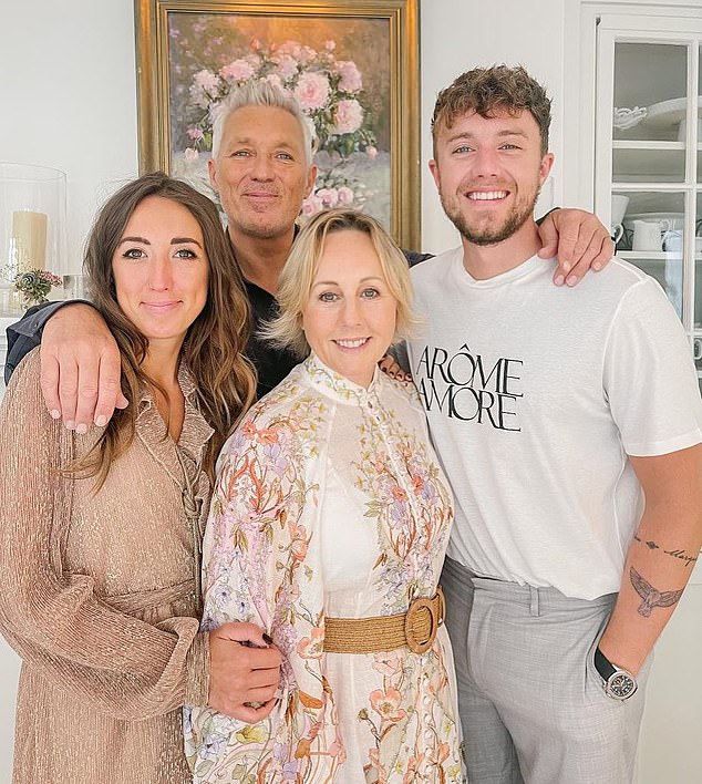 It comes after Martin's famous son Roman opened up about his desire to have children of his own, confessing he's 'terrified of not having kids' (Roman pictured with dad Martin, mum Shirlie Holliman and sister Harley)