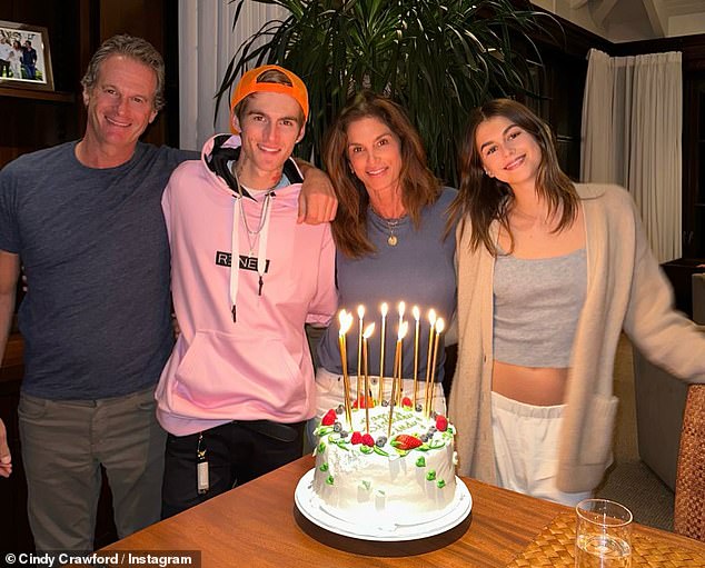 Kaia, far right, with - from left - father Rande Gerber, brother Presley and mother Cindy Crawford