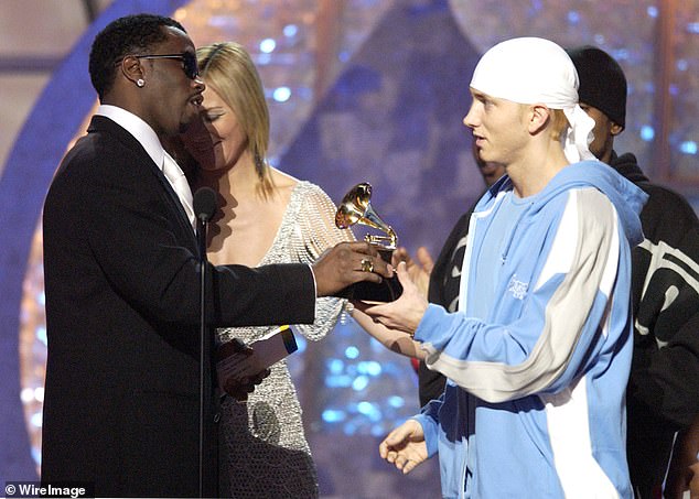 Diddy and Eminem pictured at the 45th Annual Grammy Awards