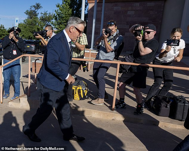 Photos suggest they may be filming throughout the trial, giving behind-the-scenes access to gather exclusive content for the Baldwins. Rosher is seen here capturing the actor as he enters the courtroom on Thursday