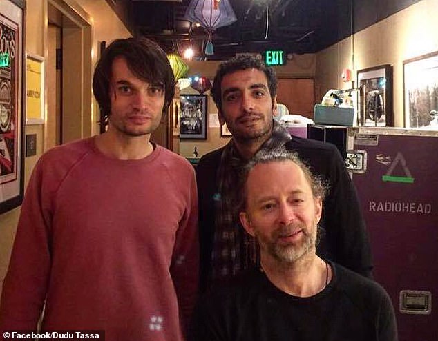 Last month, the group faced a boycott after being accused of 'artwashing the Gaza genocide' by performing in Israel. Jonny (left) and Thom (foreground) pictured with Israeli singer Dudu Tassa (right)