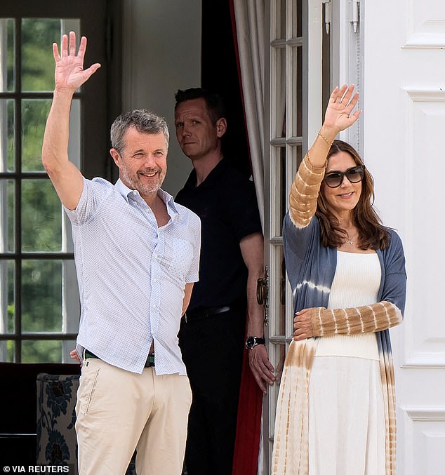 The royal couple waved for the cameras as they put on an informal show outside their summer home