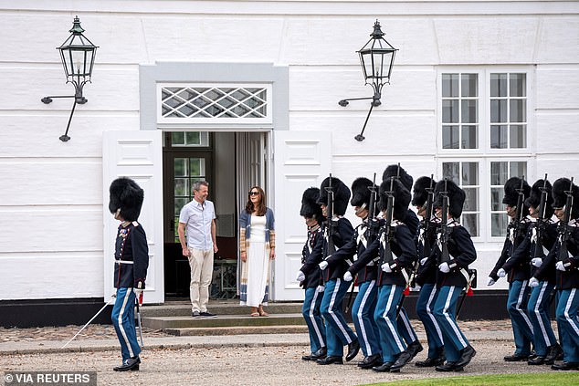 Mary and Frederik watched the action from their front door as they watched the ceremony on Friday