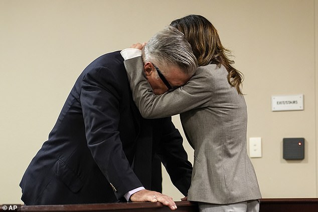 Baldwin burst into tears and hugged his wife Hilaria as his involuntary manslaughter case was sensationally dismissed