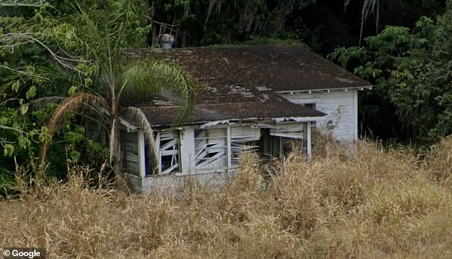 The house was abandoned and never discovered because it was covered with tall mimosa trees and other undergrowth, officials said.