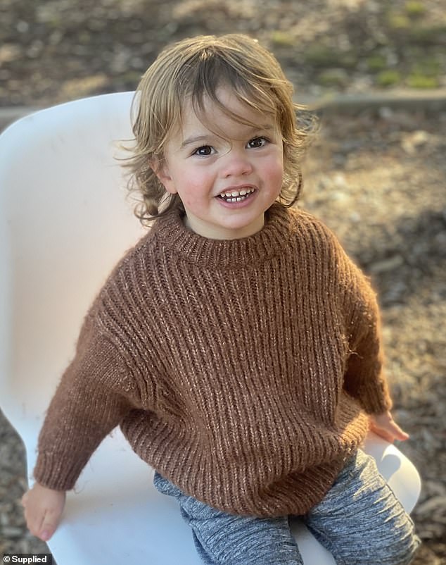 Oliver's father, John Norris, said there were no symptoms of cancer before his toddler developed a cough and that he was 'healthy' (pictured Oliver Norris)