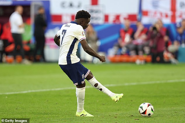 Experts advise taking deep breaths at 'tough moments of the match' - so immediately after an England goal or just before a penalty shootout (pictured: England's Bukayo Saka during the successful penalty shootout against Switzerland on July 6)