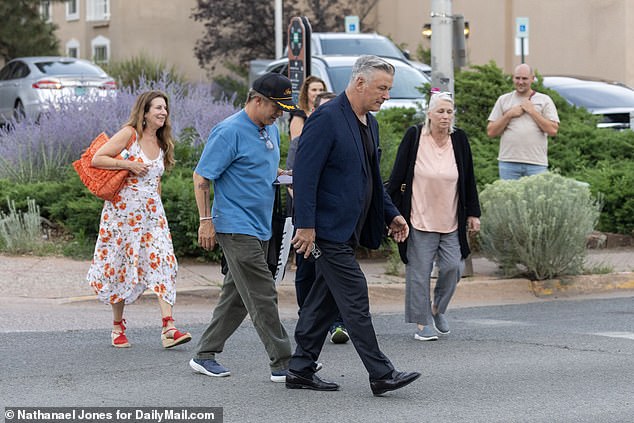 Baldwin appeared carefree as he walked into a Mexican restaurant wearing a black T-shirt, blue jacket and blue pants