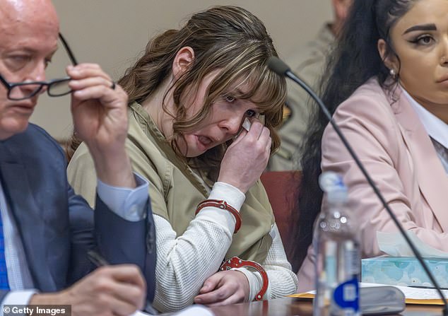 Hannah Gutierrez-Reed wipes away tears at her sentencing on April 15, 2024, where she was sentenced to 18 months in prison