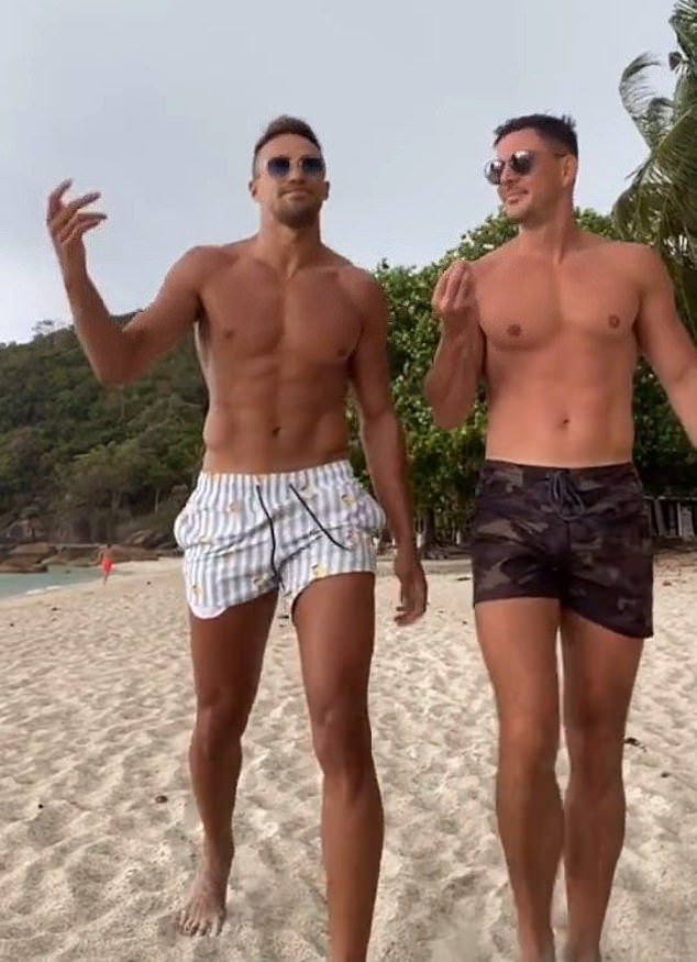 Beachgoers flock to the ocean to cool off during the unbearable heat and humidity