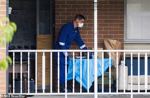 A forensic officer is seen at the Thomastown home after the alleged incident on Thursday