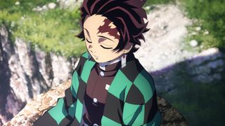 Tanjiro rests on a rock in Demon Slayer season 4