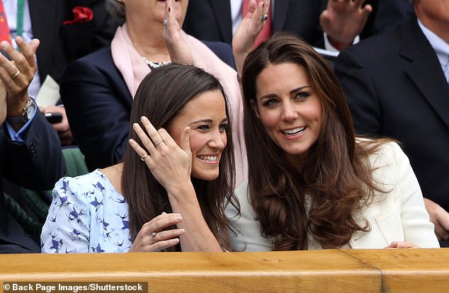 The future Princess of Wales was accompanied by her sister Pippa (left) at Wimbledon in July 2012