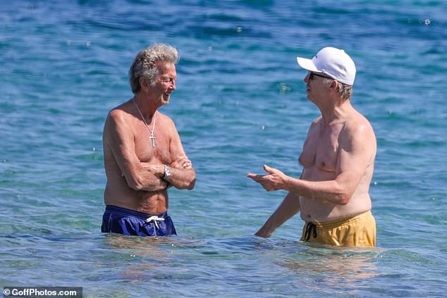 The £450million megastar, 79, who is regarded as one of the greatest guitarists of all time, was spotted taking a dip in the sea