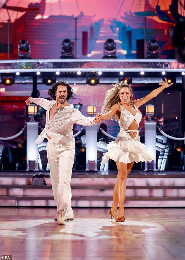 Zara McDermott (right) and Graziano Di Prime dance in matching white costumes during a dress rehearsal for the BBC show